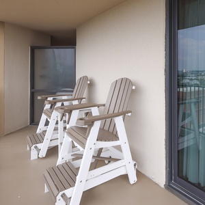 Comfortable chairs on the master balcony, perfect for enjoying fresh air and views of the surroundings