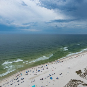 This three-bedroom offers stunning beach views, perfect for relaxing while enjoying a morning coffee from the Keurig