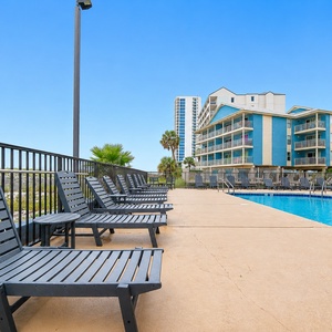Brand-new Pollywood lounge chairs and table offer the perfect place relax poolside between swims