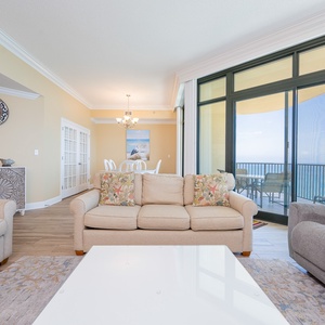Unwind after a day at the beach on the sofa, equipped with a queen sleeper, and enjoy some family time