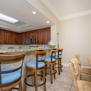 Gather around the stylish bar seating and enjoy meals prepared in the spacious kitchen