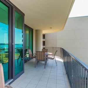 Experience refreshing breezes while lounging on the spacious balcony, taking in beautiful bay views