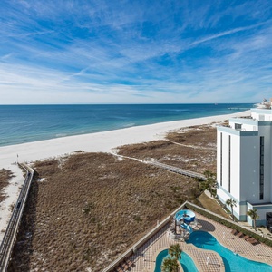 Experience seemingly endless coastline views of the horizon as waves lap the shore and the sun glistens over the water