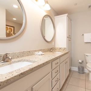 Refresh yourself at the dual vanity amidst elegant touches in the master bath, featuring a jetted tub and soothing shower