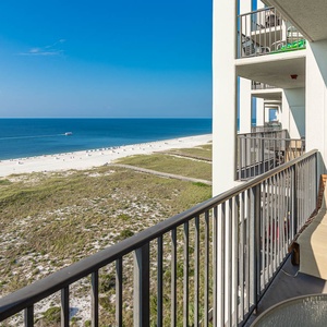 Balcony offers a serene view of the white sand beach and tranquil gulf waters, perfect for relaxation