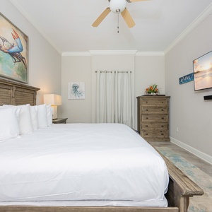 Relax on the cozy king bed in this guest suite and stream your favorite shows after a day at the beach