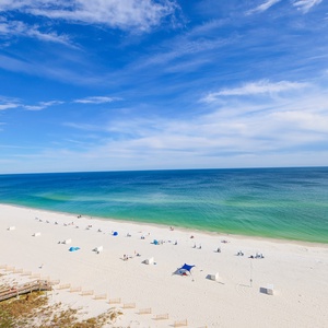 Watch the coastline stretch into the distance and the horizon meet the sky from your balcony while you soak up the sun