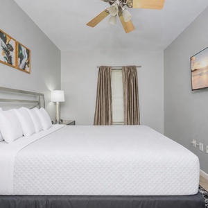 Unwind in this queen guest suite and stream your favorite shows or enjoy a good movie after a beach day