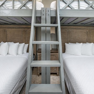 Convenient built-in ladder provides easy access to the top bunks
