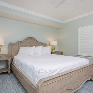 Drift into peaceful sleep on this queen guest suite, surrounded by soft lighting and tranquil coastal vibes