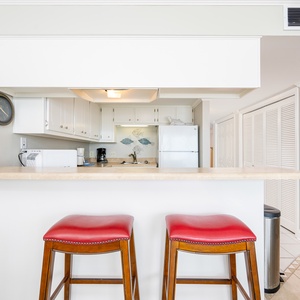Sip your morning coffee at the bar stools, surrounded by the inviting beach vibe and aromas of your favorite brew