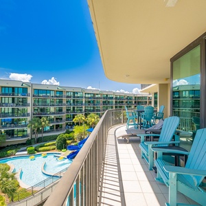 Soak up the sun on the balcony and relax with views of the lush grounds, pool area, and marina activity