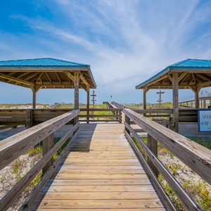Enjoy the convenience of being just steps away from the relaxing day of sun, sand, and Gulf breezes