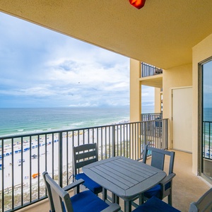 Relax on your balcony with stunning views of the coastline and soothing beach sounds