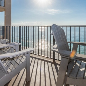 Sit back in the comfortable chairs on the balcony and enjoy the shimmering beach views under the warm sun