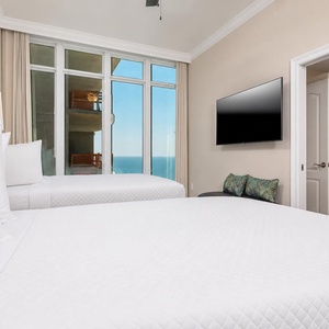 Wake on cozy double bedding, draw back the curtains, and watch the gulf sparkle in the morning sunlight