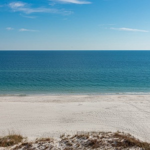 Enjoy stunning beachfront views from this inviting space, perfect for relaxation and unwinding by the shore