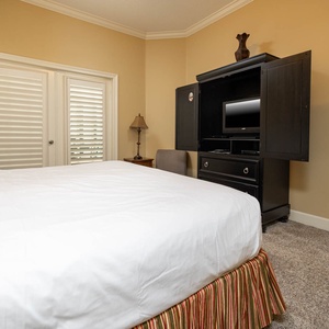 Unwind after a day at the beach in this elegant king master suite surrounded by stylish coastal accents