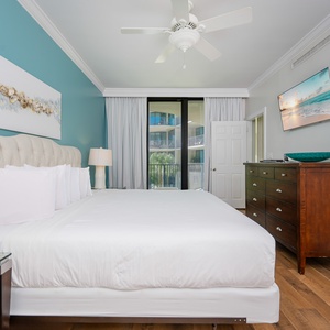 Unwind after a fun vacation day and stream your favorite shows in the king master suite with balcony access