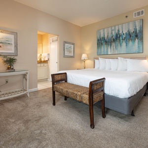 Inviting master bedroom featuring a king bed, stylish decor, and easy access to the master bath