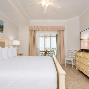 Sink into the plush king bed, surrounded by serene decor, as you unwind and recharge for beach adventures ahead