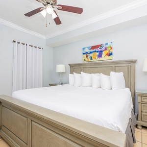 Sink into the plush comfort of the king master suite, perfect for restful nights after vacation adventures