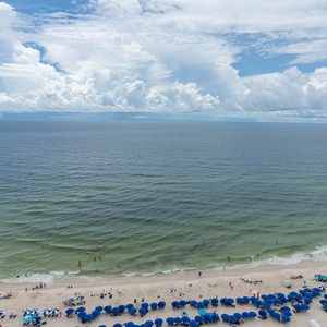 Watch the coastline stretch into the distance and the horizon meet the sky from your balcony while you soak up the sun