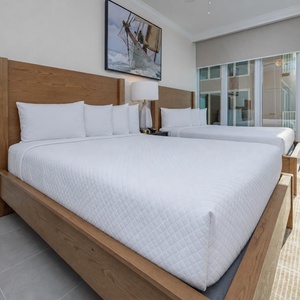 Stream your favorite shows as you relax from a day at the beach in this charming queen guest suite
