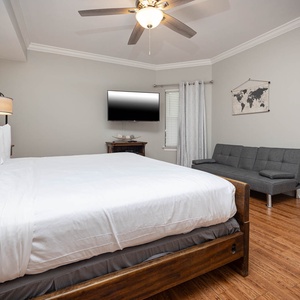 Unwind in this relaxing guest suite with a king bed and a futon and drift off into a peaceful slumber