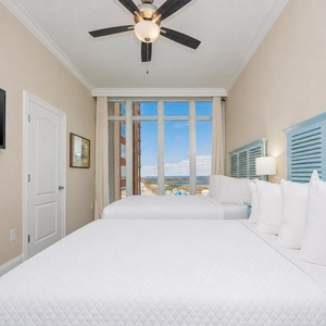 Unwind in this queen guest suite and stream your favorite shows or enjoy a good movie after a beach day