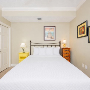 Experience restful nights on plush queen bedding while surrounded by cheerful decor that enhances your retreat