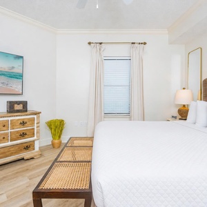 Relax on the cozy king bed in this guest suite and stream your favorite shows after a fun vacation day