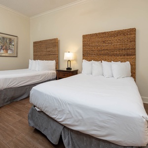 Rest easily in this guest room with two double beds, perfect for recharging after beach adventures