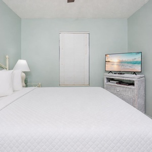 Rest peacefully on the king bed while enjoying your favorite shows streaming on the TV