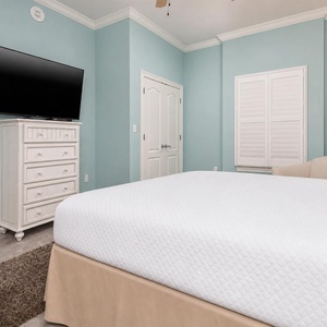 Experience cozy relaxation on the king bed in this guest suite and unwind with your favorite shows