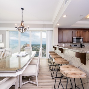 Sip your morning coffee at the breakfast bar and get ready for a beach day in this stylish space