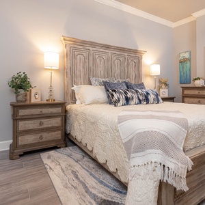 Nestle into the soft bedding in the king master suite and read beneath the warm glow of the bedside lamps