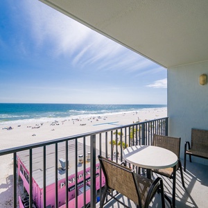 Your balcony invites you to savor the endless blue horizon and lively beach below
