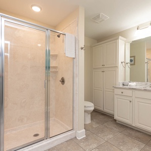 Refresh in the stylish shower, feeling revitalized as you embrace the tranquility of your beach getaway