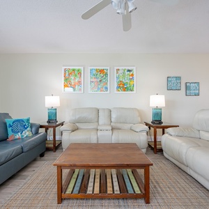 Unwind on the plush couches, one with a queen sleeper, sharing stories and laughter in this cozy living space