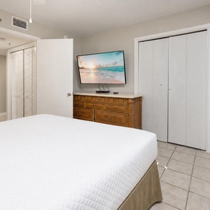 Unwind after a day at the beach in this queen guest suite with a good movie