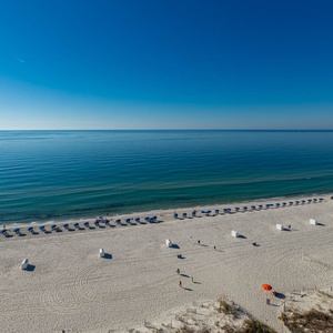 Experience the morning sunrises and stunning evening sunsets from your beachfront balcony with seamingly endless views