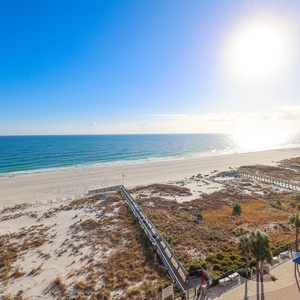 Bask in the sun with direct access to the beach and stunning views of the tranquil waters and shoreline