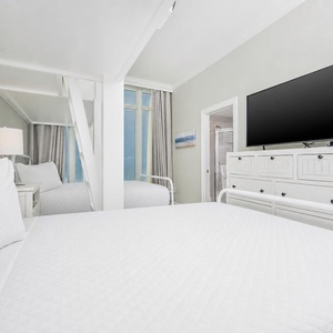 Watch shows on the large TV and enjoy stunning views from this charming bunk room