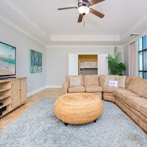 Gather in the cozy seating area, sharing laughs while streaming your favorite shows and embracing the beach vibe