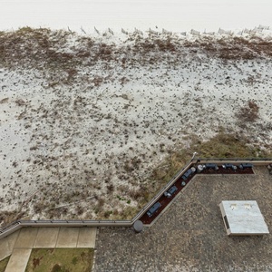 Enjoy the spacious outdoor area with seating and a grill, perfect for gatherings and enjoying the fresh gulf air