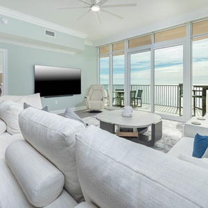 Curl up on the large sectional sofa, stream your favorite shows, then step onto your beachfront balcony