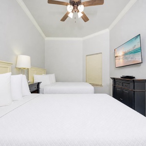 Unwind in this queen guest suite and stream your favorite shows or enjoy a good movie after a beach day