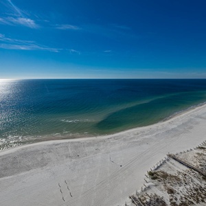 Watch the coastline stretch into the distance and the horizon meet the sky from your balcony while you soak up the sun