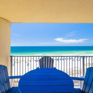 Enjoy breathtaking views from the balcony, overlooking the tranquil beach and sparkling waters, perfect for relaxation